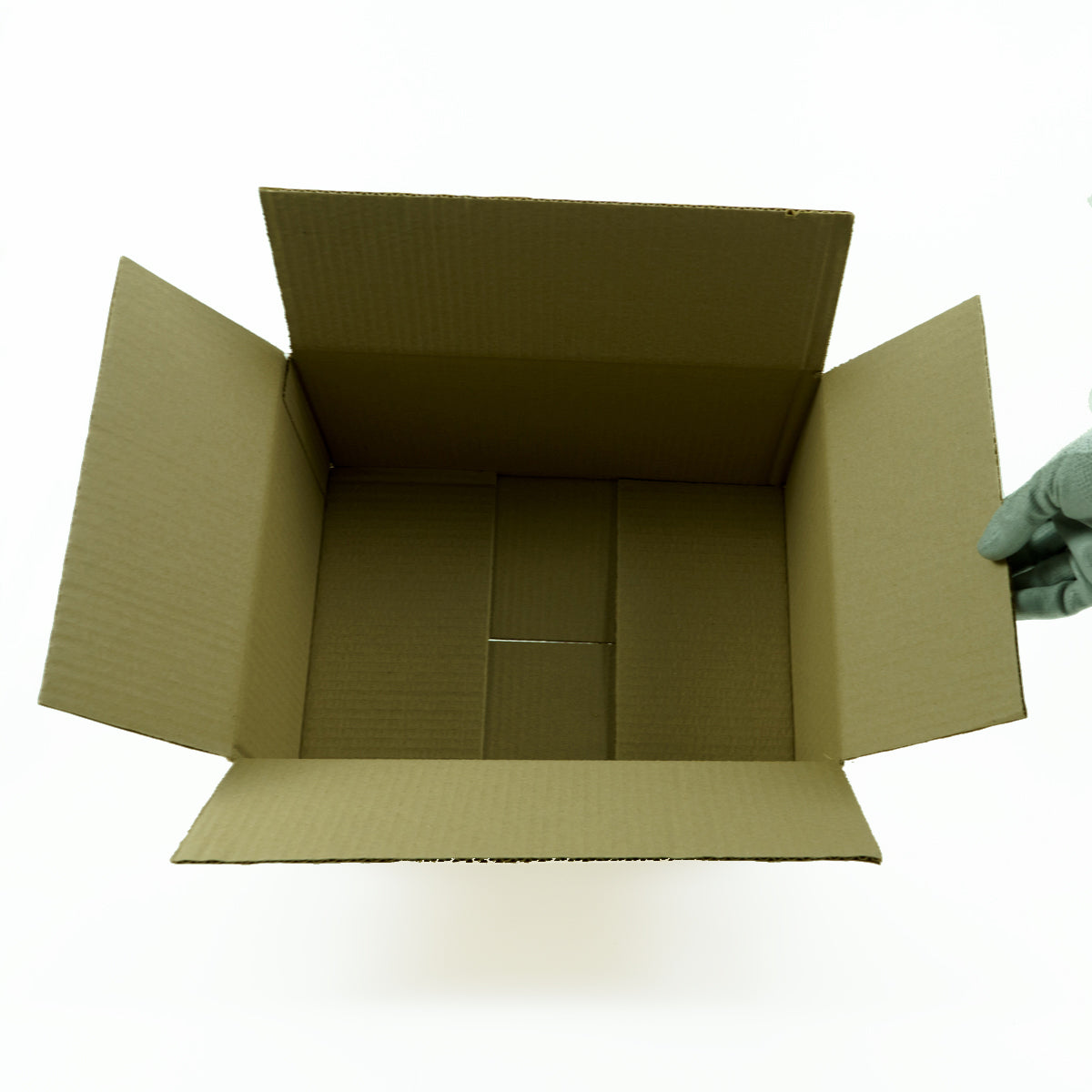 Interior de la caja de cartón 50 x 30 x 30 cm abierta, vista desde arriba